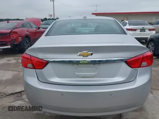 2014 Chevrolet Impala LT with VIN 2G1125S33E9103583, listed as a IAAI auction lot 42125293 with 143,951 mi miles and . Bid and sale history available at DreamBid. Image 16.