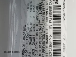 2025 Honda Civic Sport z VIN 2HGFE2F5XSH547464, wystawiony jako Copart lot #53621925 z przebiegiem Nie podano mil oraz Szkody całkowita. Historia ofert i sprzedaży dostępna na DreamBid. Obrazek 12.