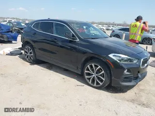 2018 BMW X2 xDrive28i with VIN WBXYJ5C33JEF80454, listed as a IAAI auction lot 41876188 with 34,596 mi miles. Bid and sale history available at carsss.com. Image 1.