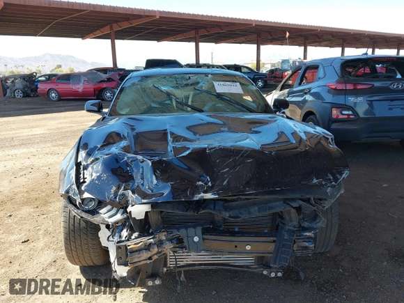 2021 Ford Mustang EcoBoost with VIN 1FA6P8TH2M5104154, listed as a IAAI auction lot 41869810 with 15,561 mi miles and . Bid and sale history available at DreamBid. Image 6.