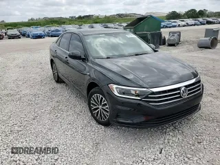 2019 Volkswagen Jetta SEL z VIN 3VWEB7BU8KM217902, wystawiony jako Copart lot #53138135 z przebiegiem 59 985 mil mil oraz Nie do naprawy • Non repairable. Historia ofert i sprzedaży dostępna na DreamBid. Obrazek 13.