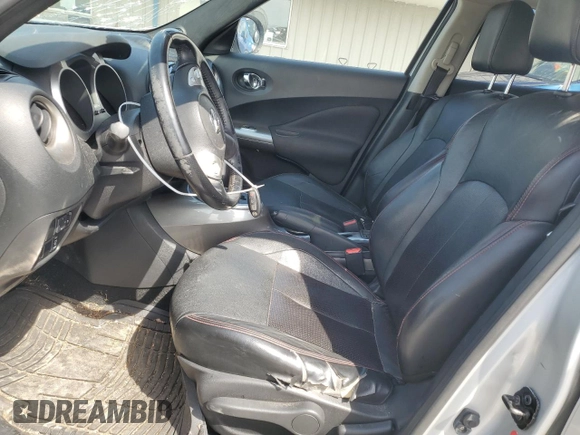 2013 Nissan Juke S with VIN JN8AF5MV7DT214627, listed as a Copart auction lot 50793025 with 130,500 mi miles and Salvage Title. Bid and sale history available at DreamBid. Image 7.