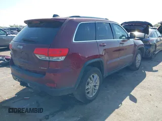 2017 Jeep Grand Cherokee Laredo with VIN 1C4RJEAG4HC674921, listed as a IAAI auction lot 41876971 with 115,773 mi miles. Bid and sale history available at carsss.com. Image 4.