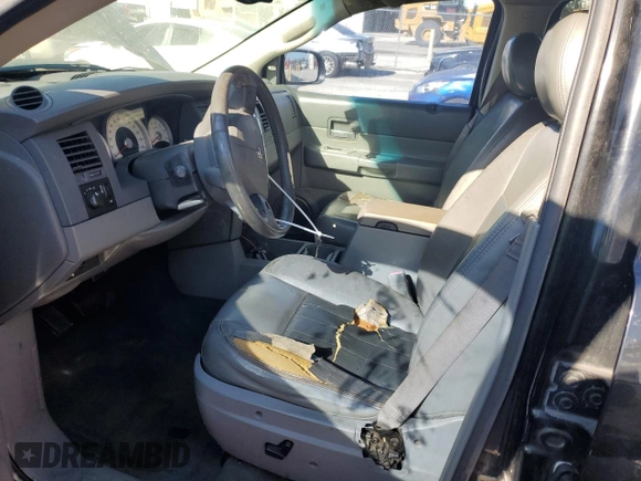 2004 Dodge Durango Limited with VIN 1D4HD58D34F230052, listed as a Copart auction lot 83030794 with 248,279 mi miles and Salvage title. Bid and sale history available at DreamBid. Image 7.