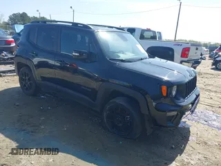 2019 Jeep Renegade Latitude z VIN ZACNJBBB9KPK60355, wystawiony jako IAAI lot #41892584 z przebiegiem 142 811 mil mil oraz . Historia ofert i sprzedaży dostępna na DreamBid. Obrazek 1.