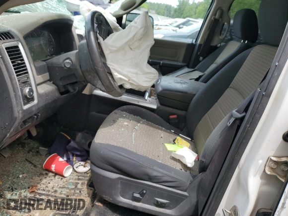 2012 Ram 2500 SLT with VIN 3C6UD5JL8CG260150, listed as a Copart auction lot 61574705 with Not provided miles and Salvage title. Bid and sale history available at DreamBid. Image 7.