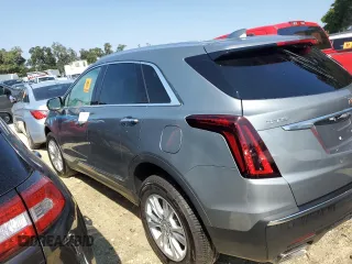 2023 Cadillac XT5 FWD Luxury z VIN 1GYKNAR4XPZ144533, wystawiony jako Copart lot #74734164 z przebiegiem Nie podano mil oraz Nie do naprawy • Non repairable. Historia ofert i sprzedaży dostępna na DreamBid. Obrazek 2.