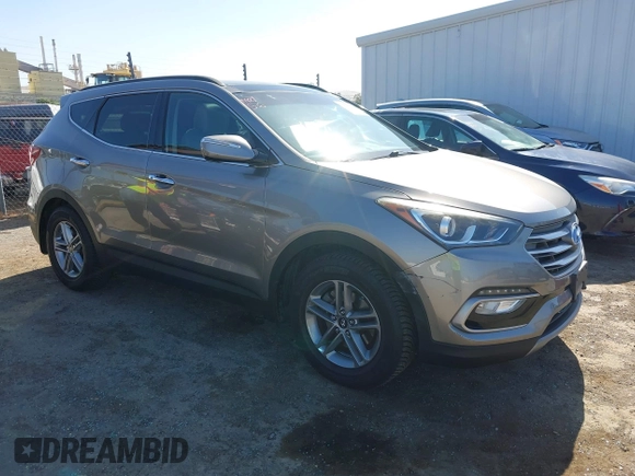 2017 Hyundai Santa Fe 2.4L z VIN 5XYZU3LB4HG446961, wystawiony jako IAAI lot #42214109 z przebiegiem 140 175 mil mil oraz . Historia ofert i sprzedaży dostępna na DreamBid. Obrazek 1.