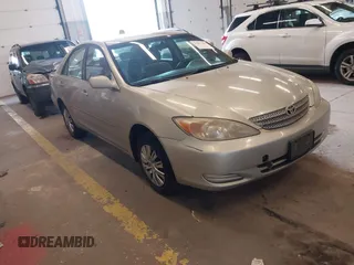 2002 Toyota Camry LE z VIN JTDBE32K820014032, wystawiony jako IAAI lot #42067688 z przebiegiem 297 325 mil mil oraz . Historia ofert i sprzedaży dostępna na DreamBid. Obrazek 1.