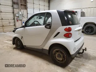 2010 Smart fortwo Pure z VIN WMEEJ3BA7AK418332, wystawiony jako Copart lot #54827925 z przebiegiem 39 972 mil mil oraz Szkoda całkowita • Salvage title. Historia ofert i sprzedaży dostępna na DreamBid. Obrazek 2.