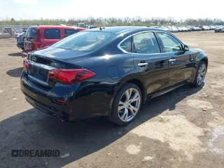 2015 Infiniti Q70 with VIN JN1BY1ARXFM562402, listed as a IAAI auction lot 41910400 with 131,469 mi miles and . Bid and sale history available at DreamBid. Image 4.
