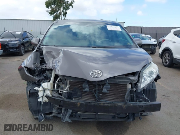 2014 Toyota Sienna XLE with VIN 5TDYK3DC7ES517206, listed as a IAAI auction lot 41945572 with 128,743 mi miles and . Bid and sale history available at DreamBid. Image 13.