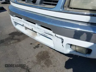 2000 Nissan Frontier XE z VIN 1N6ED27T5YC433357, wystawiony jako IAAI lot #42405160 z przebiegiem 290 620 mil mil oraz . Historia ofert i sprzedaży dostępna na DreamBid. Obrazek 12.