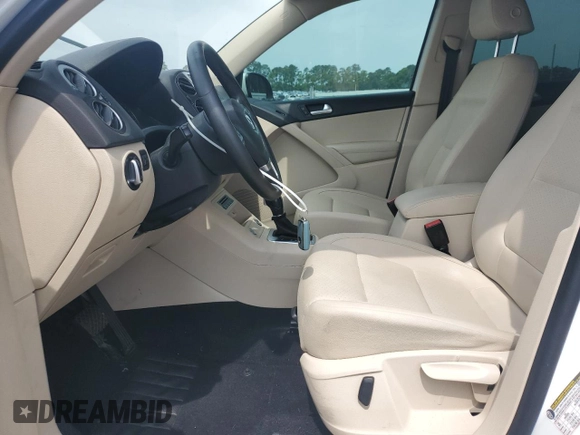 2017 Volkswagen Tiguan S with VIN WVGAV7AX7HK017576, listed as a Copart auction lot 58487455 with 100,034 mi miles and Salvage title. Bid and sale history available at DreamBid. Image 7.