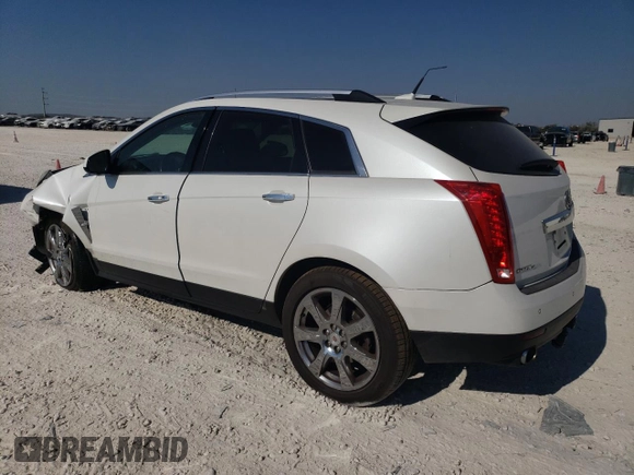 2012 Cadillac SRX Performance Collection with VIN 3GYFNEE33CS659161, listed as a Copart auction lot 76071724 with 149,586 mi miles and Salvage title. Bid and sale history available at DreamBid. Image 2.