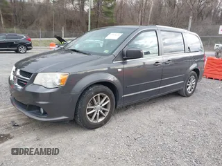 2014 Dodge Grand Caravan SXT with VIN 2C4RDGCG6ER376714, listed as a IAAI auction lot 41828025 with 172,285 mi miles and . Bid and sale history available at DreamBid. Image 17.
