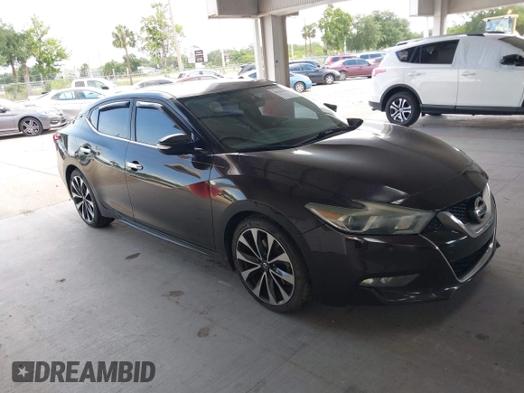 2016 Nissan Maxima SV with VIN 1N4AA6AP5GC413563, listed as a IAAI auction lot 42196144 with 209,711 mi miles and . Bid and sale history available at DreamBid. Image 14.