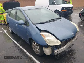 2005 Toyota Prius z VIN JTDKB20U957054655, wystawiony jako IAAI lot #41730578 z przebiegiem 276 197 mil mil oraz . Historia ofert i sprzedaży dostępna na DreamBid. Obrazek 1.