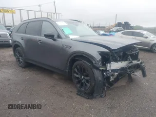 2025 Mazda CX-90 Premium Sport z VIN JM3KKCHA6S1196886, wystawiony jako IAAI lot #42214967 z przebiegiem 23 577 mil mil oraz . Historia ofert i sprzedaży dostępna na DreamBid. Obrazek 1.