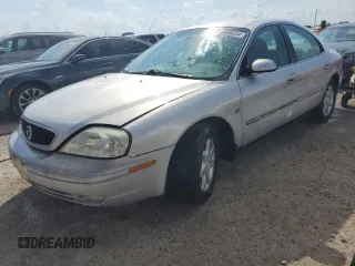 2002 Mercury Sable LS with VIN 1MEHM55SX2A619019, listed as a Copart auction lot 74205254 with 71,677 mi miles and Salvage Title. Bid and sale history available at DreamBid. Image 1.