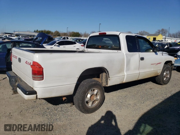 1999 Dodge Dakota SLT with VIN 1B7GG22Y6XS119274, listed as a Copart auction lot 46947005 with 264,537 mi miles and Salvage Title. Bid and sale history available at DreamBid. Image 3.
