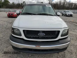 2002 Ford F-150 XL with VIN 1FTRX17W12NA96391, listed as a Copart auction lot 87000064 with 199,867 mi miles and Salvage Title. Bid and sale history available at carsss.com. Image 5.