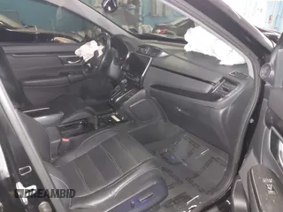 2020 Honda CR-V Touring with VIN 2HKRW2H94LH663650, listed as a IAAI auction lot 41570549 with 29,571 mi miles and . Bid and sale history available at DreamBid. Image 5.