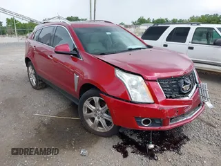 2014 Cadillac SRX Performance Collection z VIN 3GYFNCE35ES660013, wystawiony jako IAAI lot #42605759 z przebiegiem 146 543 mil mil oraz . Historia ofert i sprzedaży dostępna na DreamBid. Obrazek 1.