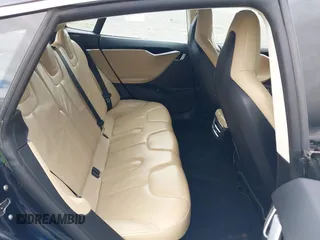 2013 Tesla Model S с VIN 5YJSA1CN1DFP05559, выставлен на аукционе IAAI как лот 42249943 с пробегом 134 399 миль миль и . История ставок и продаж доступна на DreamBid. Изображение 8.