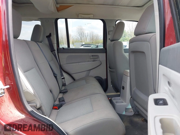 2008 Jeep Liberty Sport with VIN 1J8GN28K68W111462, listed as a IAAI auction lot 42012567 with 129,077 mi miles. Bid and sale history available at carsss.com. Image 8.