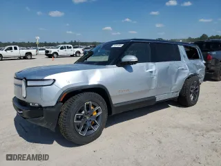 2024 Rivian R1S Adventure with VIN 7PDSGABA5RN033603, listed as a Copart auction lot 74201084 with 0 mi miles and Salvage Title. Bid and sale history available at carsss.com. Image 1.