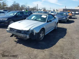 2003 Ford Mustang Deluxe with VIN 1FAFP44463F447563, listed as a IAAI auction lot 41810940 with 88,590 mi miles. Bid and sale history available at carsss.com. Image 2.