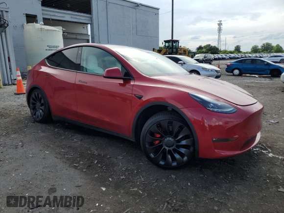 2022 Tesla Model Y Performance with VIN 7SAYGDEF6NF337996, listed as a Copart auction lot 56039515 with 16,468 mi miles and Salvage title. Bid and sale history available at DreamBid. Image 7.