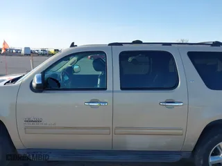 2012 Chevrolet Suburban LT with VIN 1GNSCJE07CR144215, listed as a IAAI auction lot 41924631 with 144,072 mi miles. Bid and sale history available at carsss.com. Image 14.
