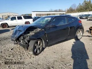 2015 Hyundai Veloster z VIN KMHTC6AD6FU228929, wystawiony jako Copart lot #42785935 z przebiegiem Nie podano mil oraz Szkoda całkowita • Salvage title. Historia ofert i sprzedaży dostępna na DreamBid. Obrazek 1.