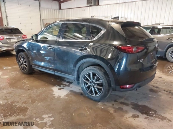 2017 Mazda CX-5 Grand Touring with VIN JM3KFBDLXH0206999, listed as a IAAI auction lot 41649611 with 73,382 mi miles. Bid and sale history available at carsss.com. Image 3.