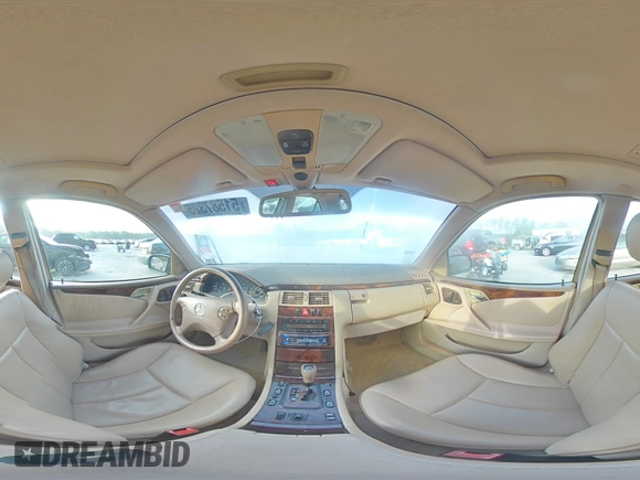 2000 Mercedes-Benz E-Class with VIN WDBJF65J1YB103093, listed as a Copart auction lot 51587325 with 208,350 mi miles and Salvage Title. Bid and sale history available at carsss.com. Image 12.