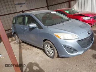 2012 Mazda 5 Sport with VIN JM1CW2BL0C0112218, listed as a IAAI auction lot 41806083 with 183,197 mi miles and . Bid and sale history available at carsss.com. Image 14.