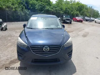 2016 Mazda CX-5 Grand Touring z VIN JM3KE4DY1G0817562, wystawiony jako IAAI lot #42289929 z przebiegiem 135 476 mil mil oraz . Historia ofert i sprzedaży dostępna na DreamBid. Obrazek 12.