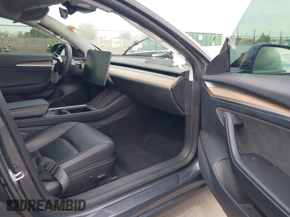 2022 Tesla Model 3 Performance with VIN 5YJ3E1EC3NF296891, listed as a IAAI auction lot 41808329 with 82,682 mi miles and . Bid and sale history available at DreamBid. Image 5.