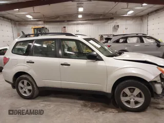 2012 Subaru Forester X with VIN JF2SHBBCXCH433191, listed as a IAAI auction lot 41964271 with 146,176 mi miles and . Bid and sale history available at DreamBid. Image 13.
