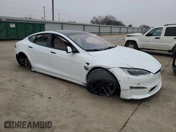 2021 Tesla Model S Plaid с VIN 5YJSA1E6XMF455258, выставлен на аукционе Copart как лот 43788675 с пробегом Не указан миль и Списание • Salvage title. История ставок и продаж доступна на DreamBid. Изображение 4.