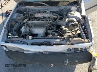 1990 Toyota Camry z VIN JT2SV21W7L0364695, wystawiony jako Copart lot #75491924 z przebiegiem 262 028 mil mil oraz Szkoda całkowita • Salvage title. Historia ofert i sprzedaży dostępna na DreamBid. Obrazek 12.
