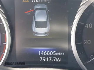 2014 Infiniti Q50 Premium z VIN JN1BV7AP8EM691683, wystawiony jako IAAI lot #42064258 z przebiegiem 146 805 mil mil oraz . Historia ofert i sprzedaży dostępna na DreamBid. Obrazek 16.