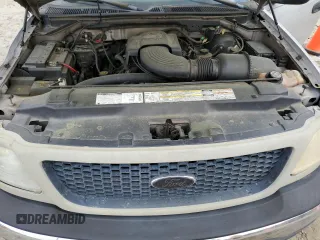 2000 Ford F-150 XL with VIN 1FTRX07W3YKA40036, listed as a Copart auction lot 51795085 with Not provided miles and Salvage title. Bid and sale history available at DreamBid. Image 11.