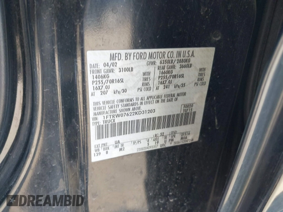 2002 Ford F-150 XLT with VIN 1FTRW07622KD31203, listed as a IAAI auction lot 41401506 with 166,949 mi miles. Bid and sale history available at carsss.com. Image 9.
