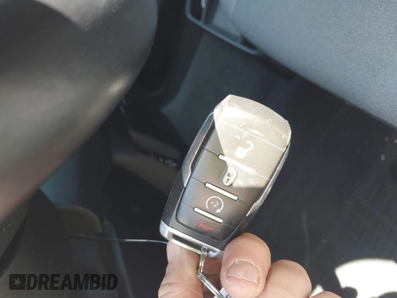 2021 Ram 1500 Big Horn with VIN 1C6SRFFT7MN620668, listed as a IAAI auction lot 42183592 with 74,829 mi miles and . Bid and sale history available at DreamBid. Image 11.