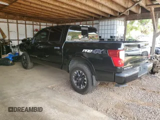 2018 Nissan Titan Pro-4X z VIN 1N6AA1E51JN531463, wystawiony jako Copart lot #52995885 z przebiegiem 62 873 mil mil oraz Szkoda całkowita • Salvage title. Historia ofert i sprzedaży dostępna na DreamBid. Obrazek 2.