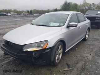 2013 Volkswagen Passat SE w/Sunroof with VIN 1VWBP7A37DC078427, listed as a IAAI auction lot 41942792 with 111,568 mi miles. Bid and sale history available at carsss.com. Image 2.