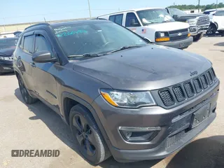 2021 Jeep Compass Altitude with VIN 3C4NJCBB7MT527321, listed as a IAAI auction lot 42266484 with 165,124 mi miles and . Bid and sale history available at DreamBid. Image 1.